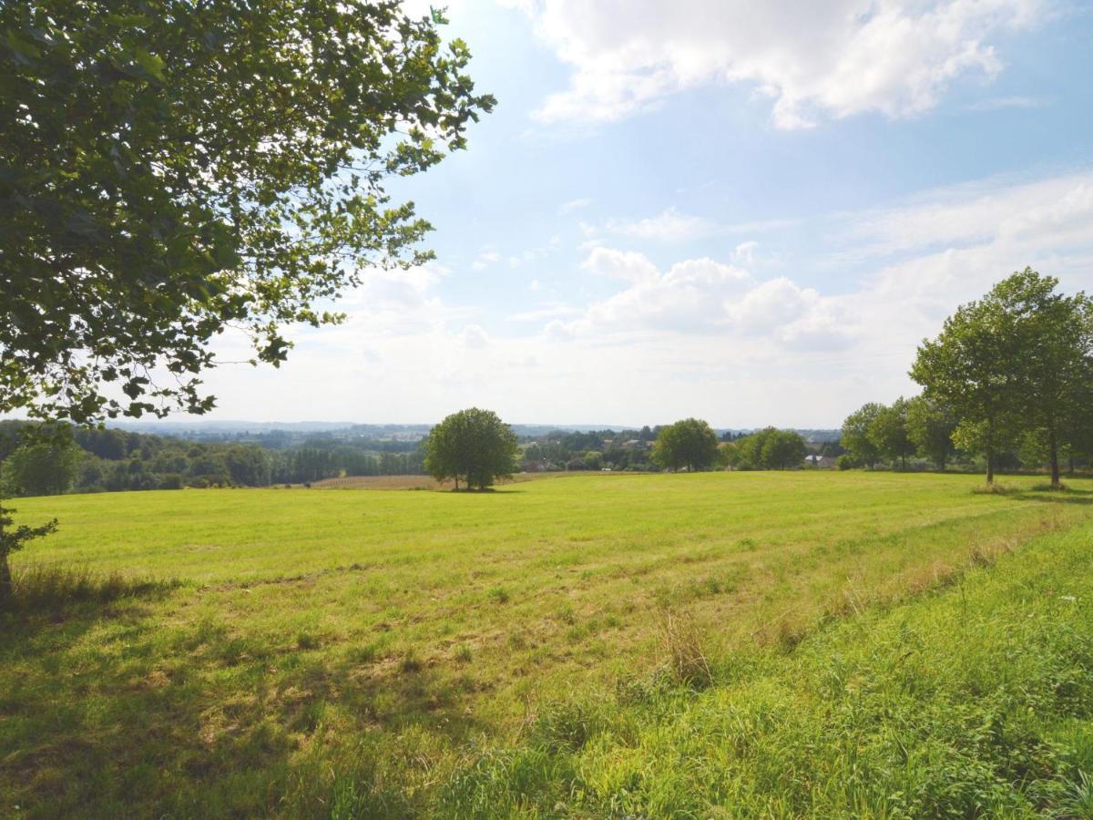 With A Broad View Over The Hilly Landscape Flobecq Exterior photo